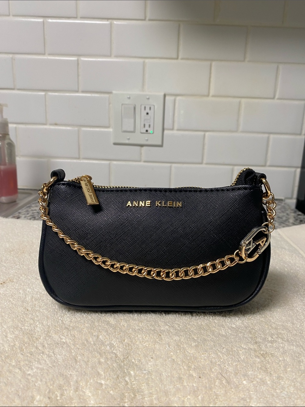 Anne Klein Black Wristlet with Gold Chain